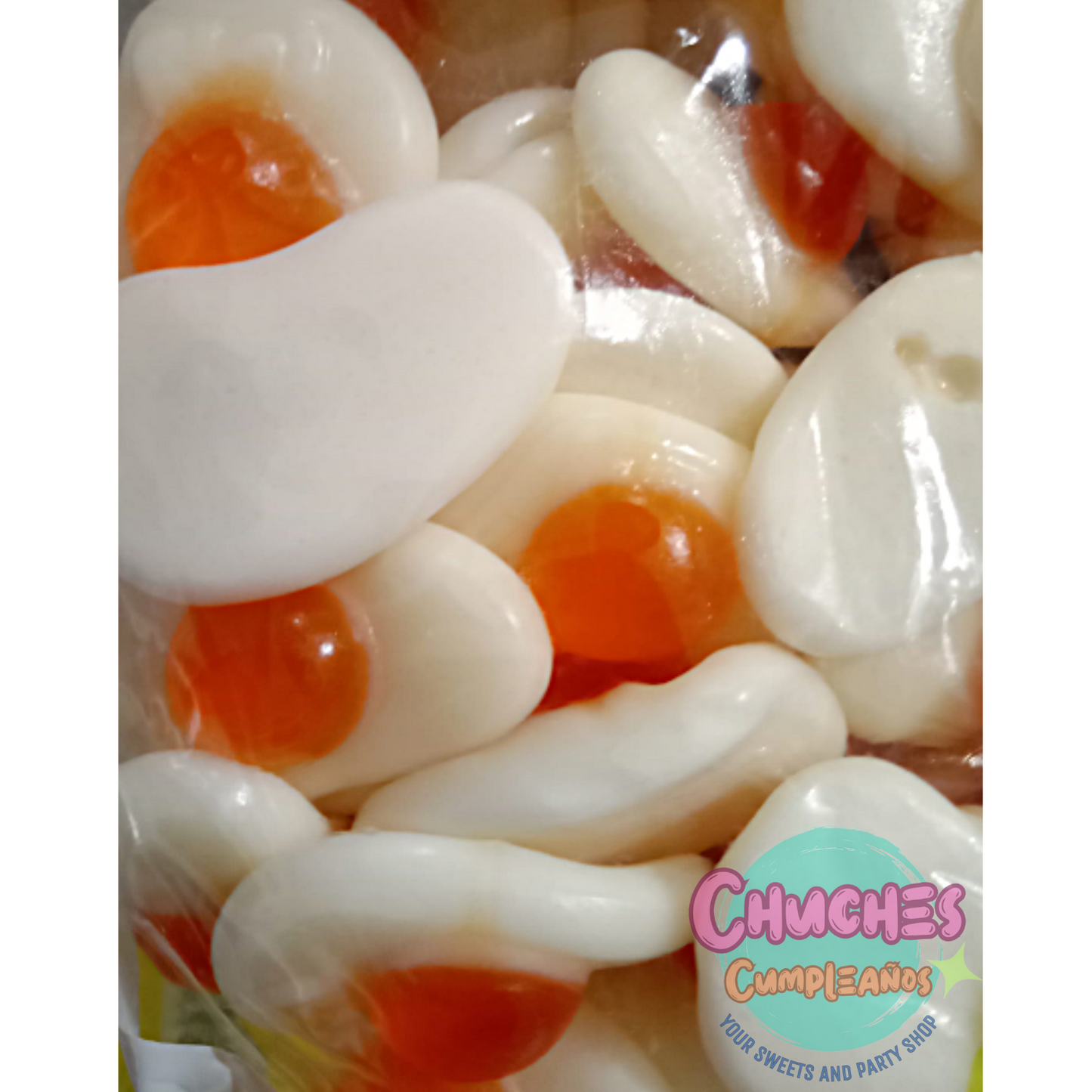 GRUPO DE GOMINOLAS CON FORMA DE HUEVOS FRITOS Y SABOR A NATA